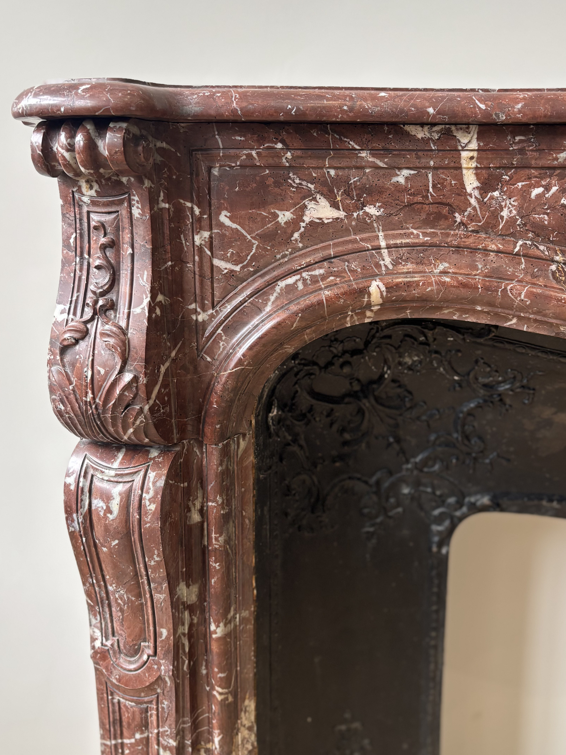 Fireplace In Red Marble Veined With White, With Wrought Iron Plate