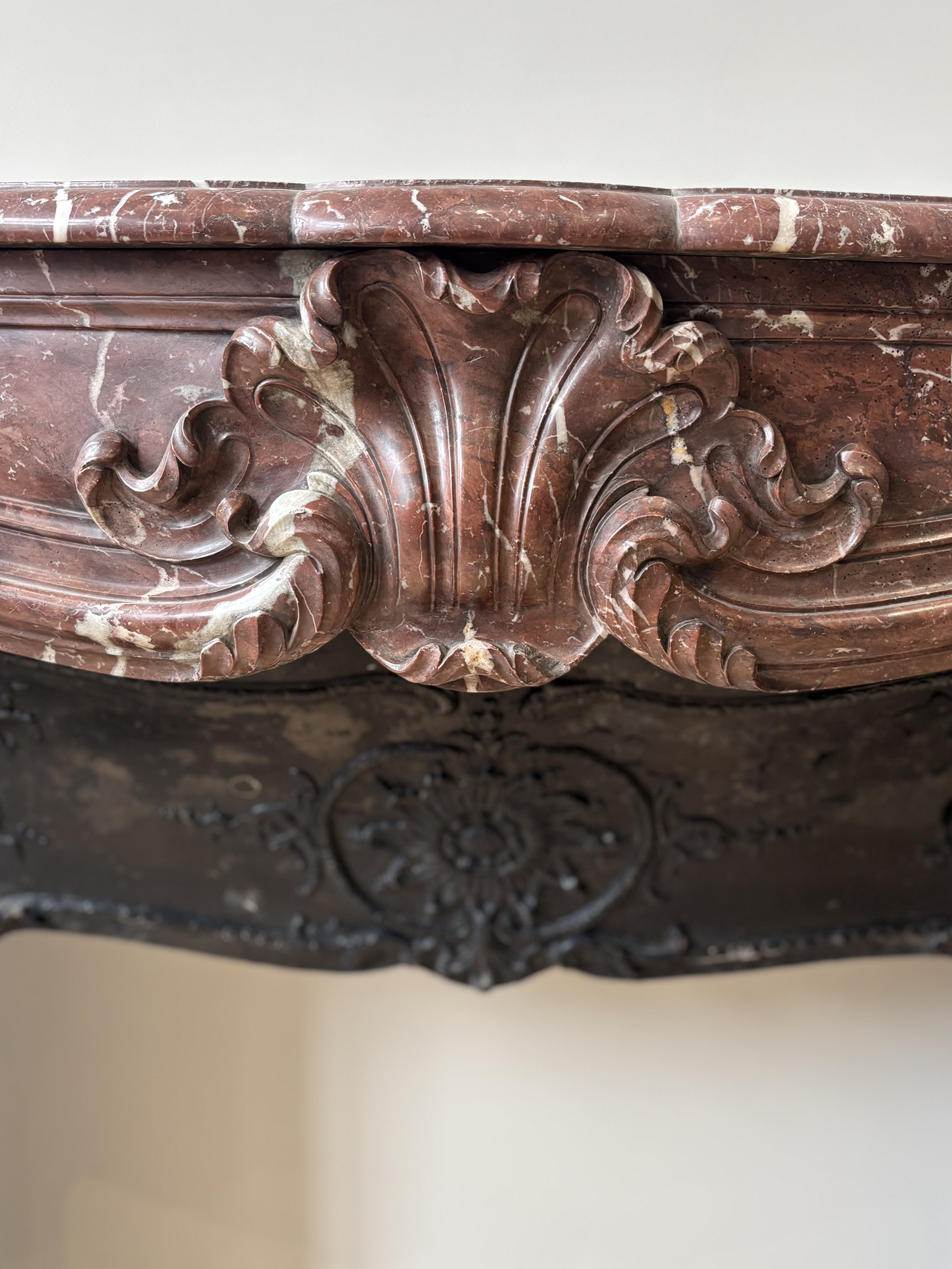 Fireplace In Red Marble Veined With White, With Wrought Iron Plate