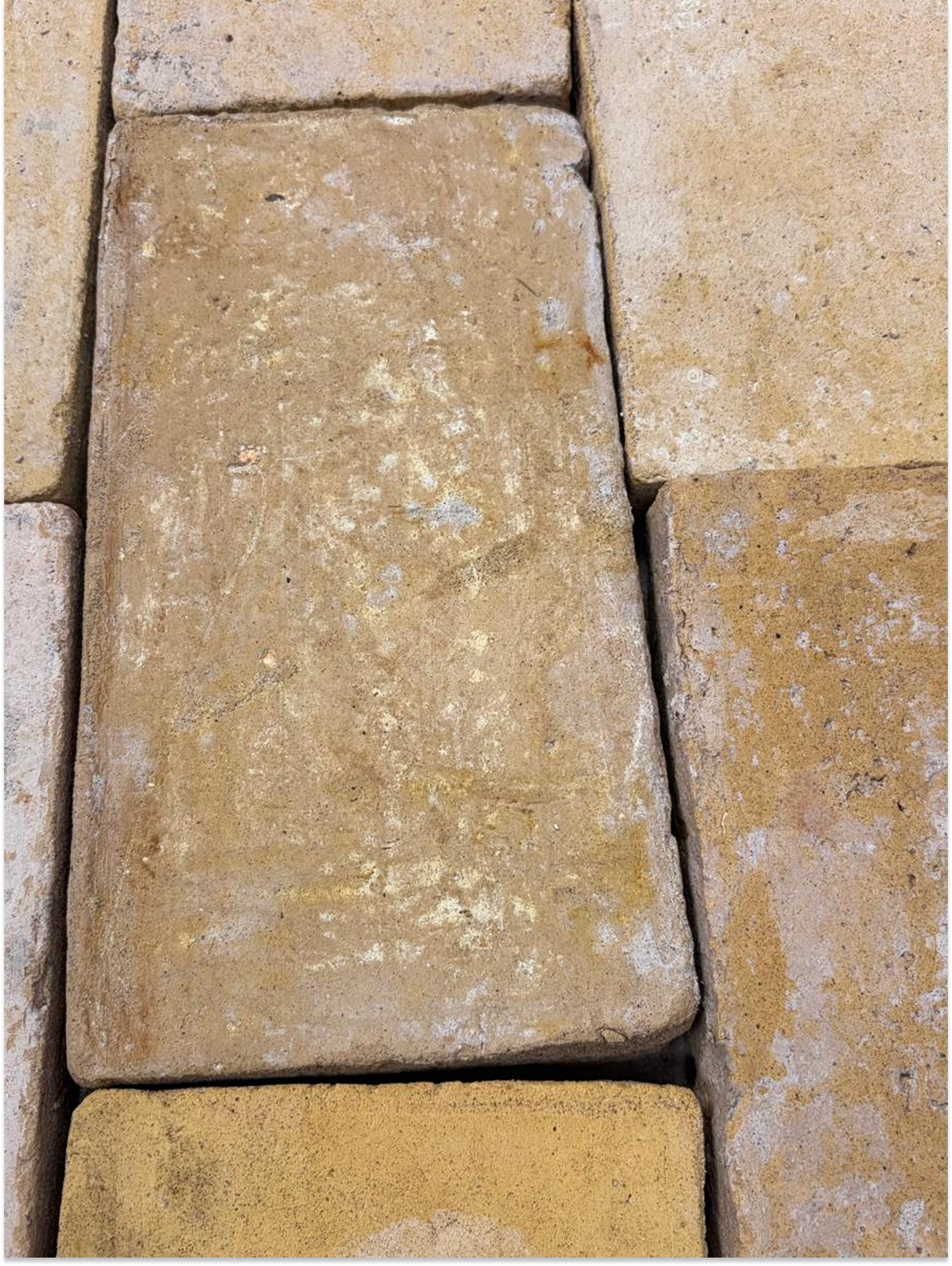 Historic French terracotta flooring with natural patina
